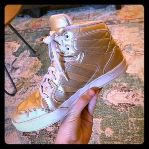 Metallic gold adidas high tops
